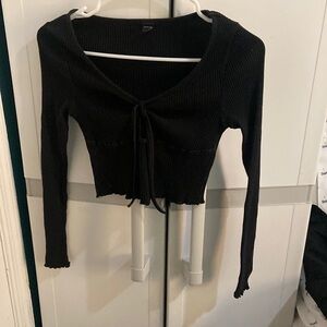 Black cropped long sleeve top